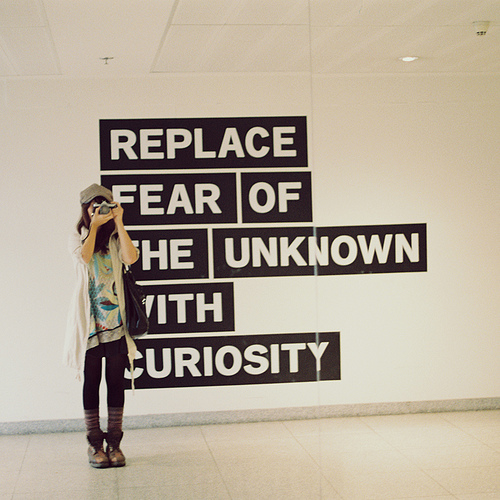 Art installation that says "Replace Fear of the Unknown with Curiosity"