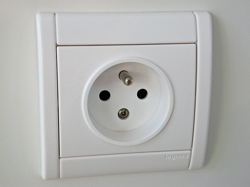 A French power socket, which only accepts plugs with two male pins and one female socket and is designed to only accept them in one orientation.