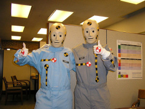 Two people dressed as crash test dummies with their thumbs up. Does following Agile processes to the letter mean your team will be safe and succeed?