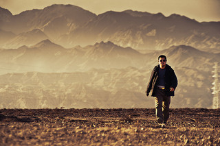 A cool-looking man walking alone in a desert. Singletons are not as pervasive as they used to be in Java, but perhaps Scala will make them cool again.