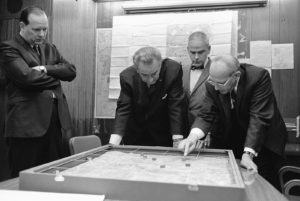 L.B. Johnson in a Vietnam situation room. War offensives are often used as an analogy for product strategy